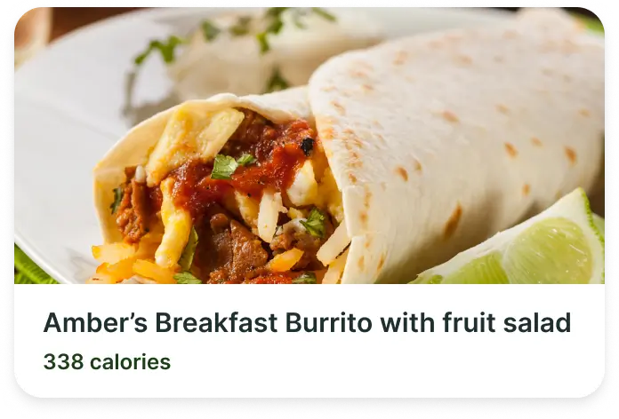 UI element from a fitness app showing a recipe named Ambers Breakfast burrito with fruit salad